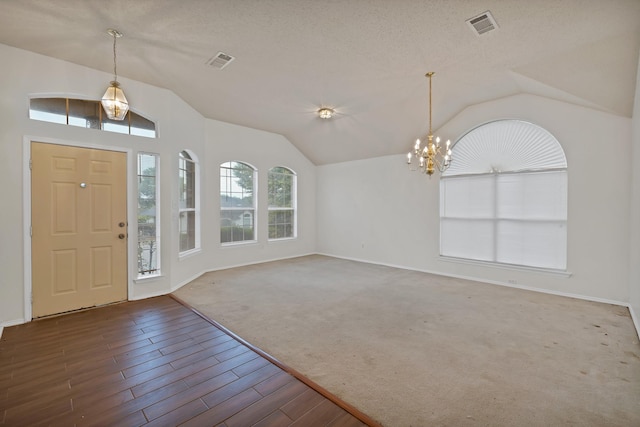 520 Jeff Grimes Blvd, Desoto, TX 75115 - foyer featuring visible vents, baseboards, a chandelier, and vaulted ceiling