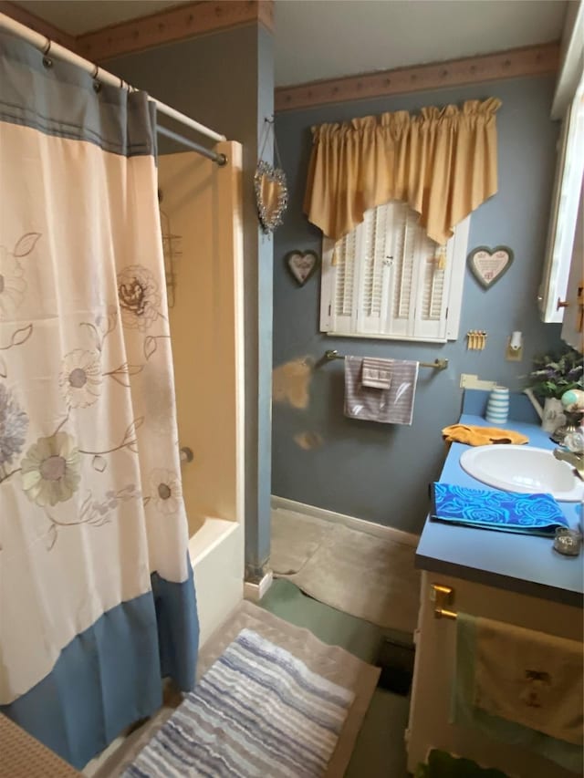 bathroom with vanity and shower / bath combination with curtain
