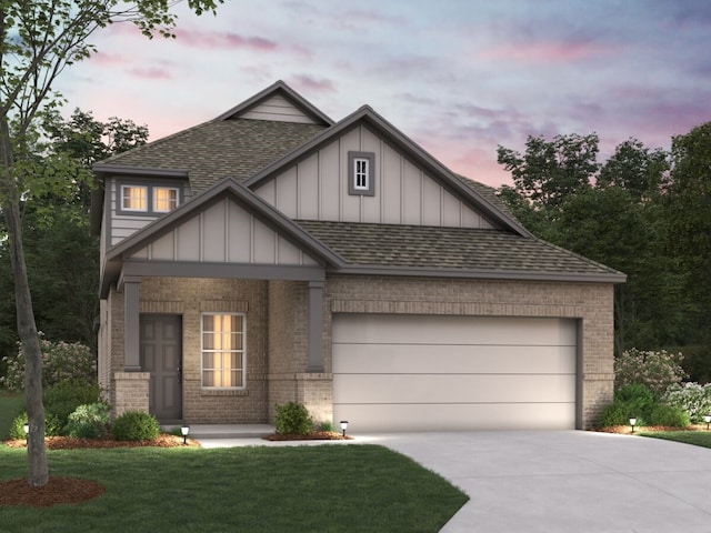 craftsman-style house with a garage, roof with shingles, brick siding, board and batten siding, and driveway
