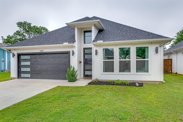 3410 Navaro St, Dallas, TX 75212 - view of front of home featuring a shingled roof, a garage, and driveway