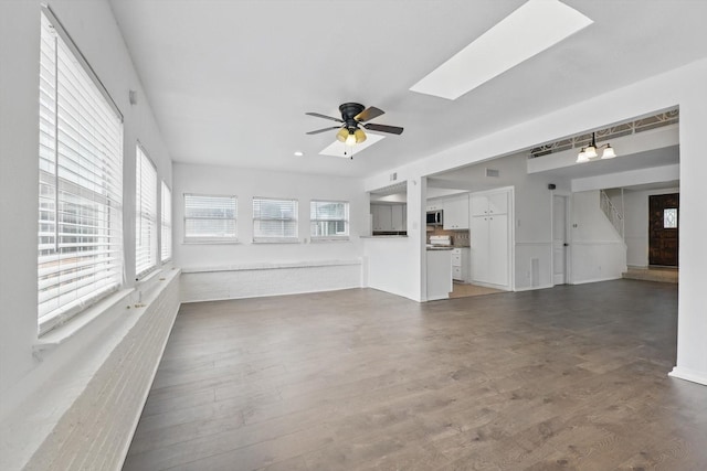 interior space featuring a skylight
