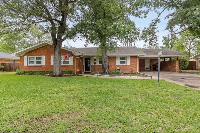 2019 W Belclaire Cir, Corsicana, TX 75110 - ranch-style home with fence, driveway, brick siding, and a front yard