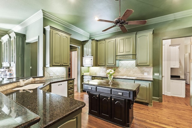 1304 Regency Ct, Southlake, TX 76092 - kitchen with white appliances, a sink, green cabinets, crown molding, and a ceiling fan