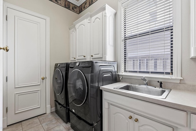 1304 Regency Ct, Southlake, TX 76092 - laundry area with washer and clothes dryer, cabinet space, healthy amount of natural light, and light tile patterned floors