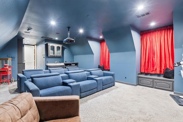 1304 Regency Ct, Southlake, TX 76092 - carpeted home theater room featuring vaulted ceiling, wet bar, and recessed lighting