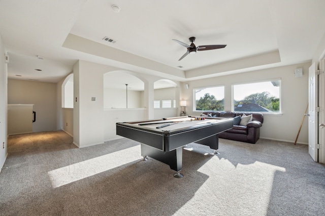 rec room featuring a tray ceiling, carpet flooring, billiards, and a ceiling fan