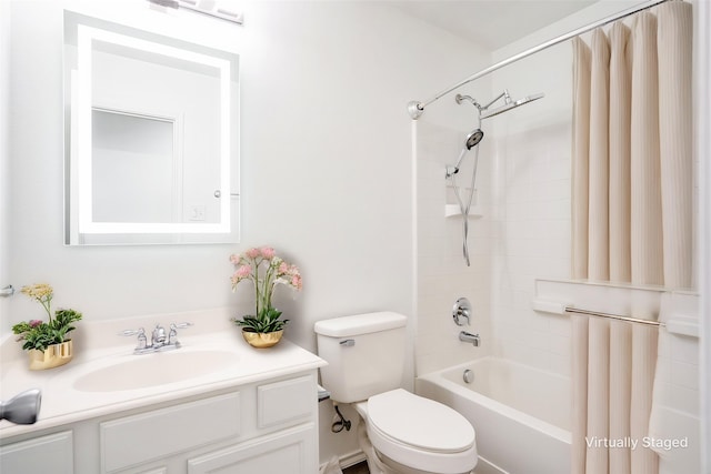 bathroom with toilet, shower / tub combo with curtain, and vanity