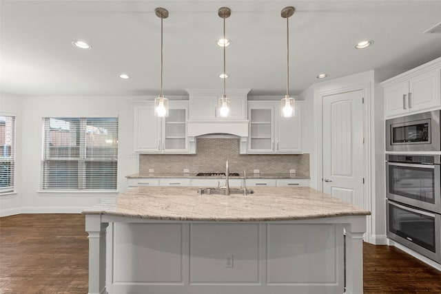 2026 Grassland Dr, Allen, TX 75013 - kitchen featuring white cabinets, dark wood-style flooring, a sink, stainless steel appliances, and tasteful backsplash