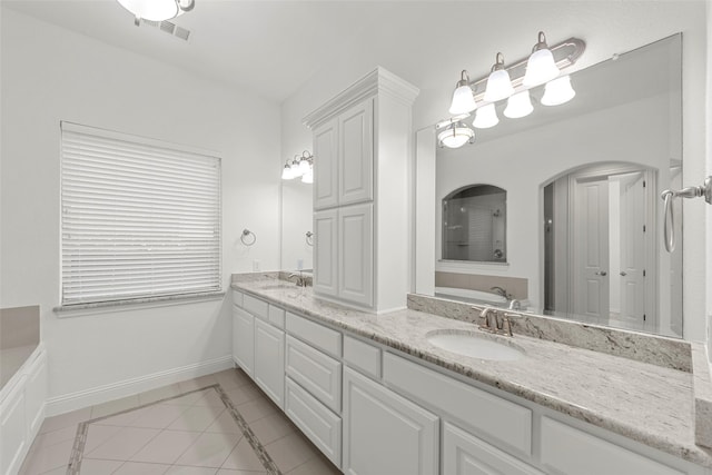 2026 Grassland Dr, Allen, TX 75013 - bathroom featuring a sink, tile patterned flooring, a bath, and visible vents