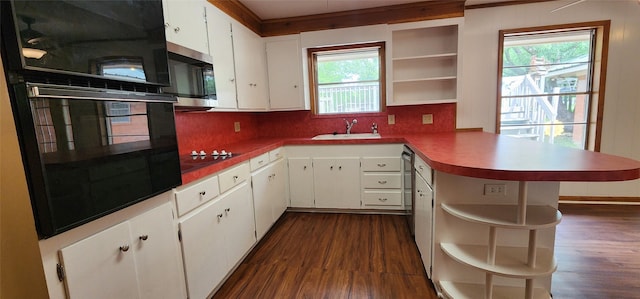 kitchen with open shelves, a sink, dark wood-style flooring, and black appliances