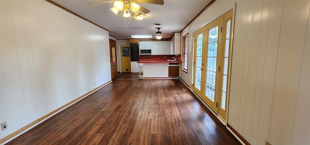 interior space with crown molding, ceiling fan, dark wood finished floors, and french doors