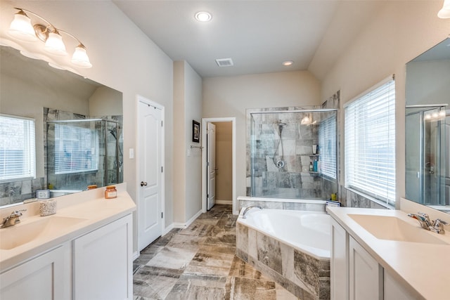 1821 Beacon Beach Way, Wylie, TX 75098 - bathroom with two vanities, a stall shower, a garden tub, and recessed lighting