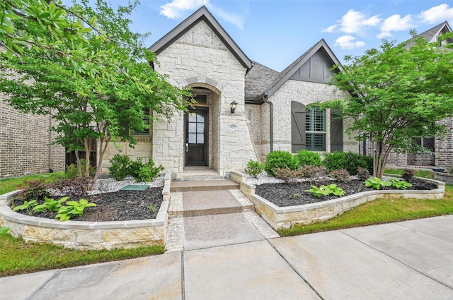 view of front of home with stone siding