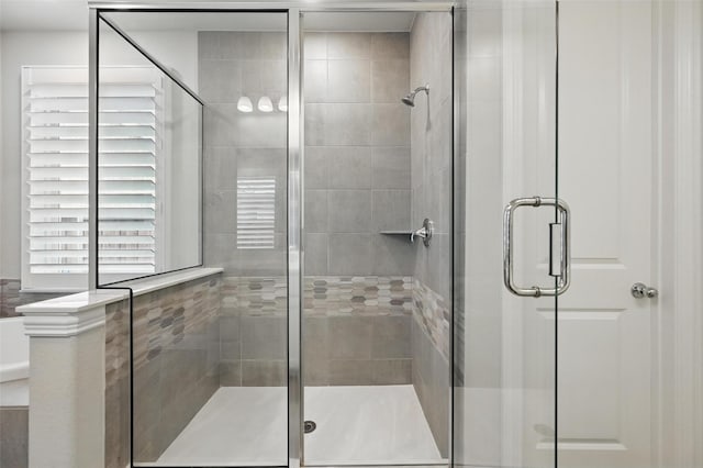 bathroom with a stall shower