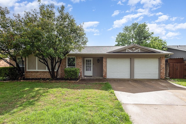 ranch-style house featuring a garage, concrete driveway, and brick siding