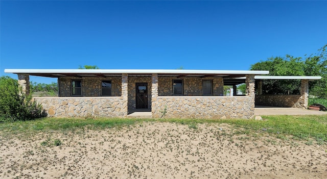 view of front of property with stone siding