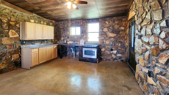 kitchen featuring concrete flooring, ceiling fan, wood ceiling, and a wood stove