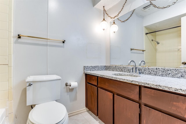 full bath featuring vanity, tile patterned flooring, baseboards, and toilet
