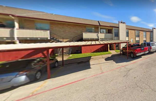 covered parking lot with stairway