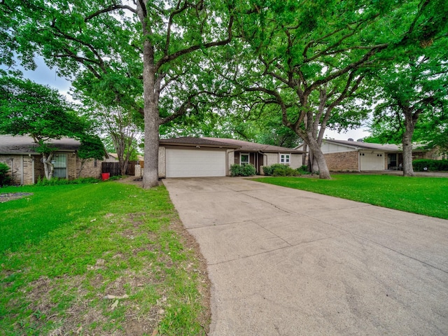 ranch-style house featuring driveway, brick siding, fence, a front lawn, and an attached garage