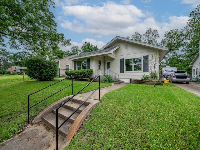 ranch-style home with a front lawn