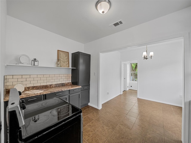 kitchen featuring decorative backsplash, black / electric stove, visible vents, open shelves, and baseboards