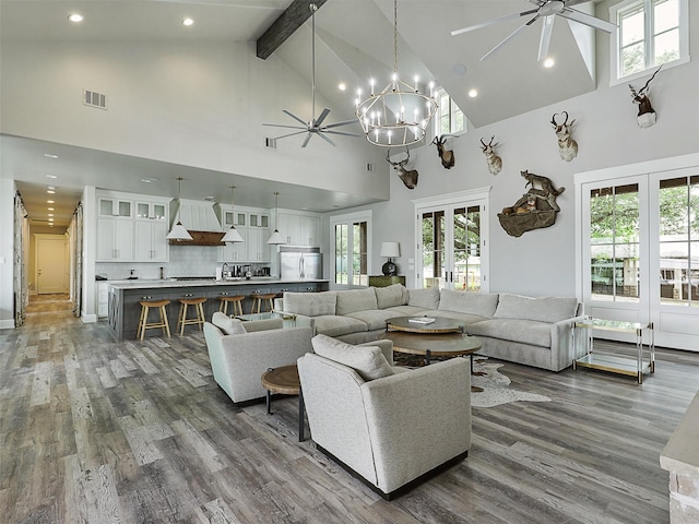 1018 Chaparrel Ln, Graford, TX 76449 - living room featuring ceiling fan, high vaulted ceiling, dark wood finished floors, a chandelier, and beam ceiling