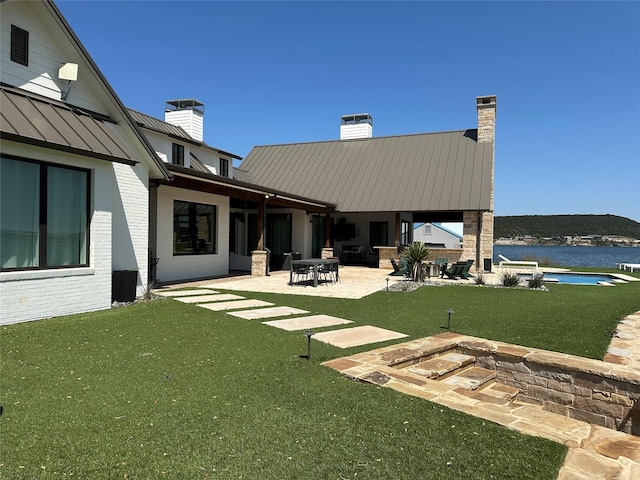 1018 Chaparrel Ln, Graford, TX 76449 - view of green lawn with a patio area and an outdoor pool