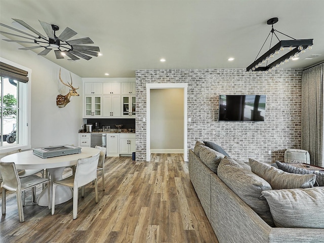 1018 Chaparrel Ln, Graford, TX 76449 - living area with wood finished floors, recessed lighting, ceiling fan, and bar area