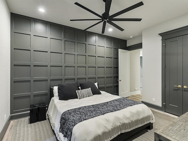 1018 Chaparrel Ln, Graford, TX 76449 - bedroom with a decorative wall, recessed lighting, and baseboards