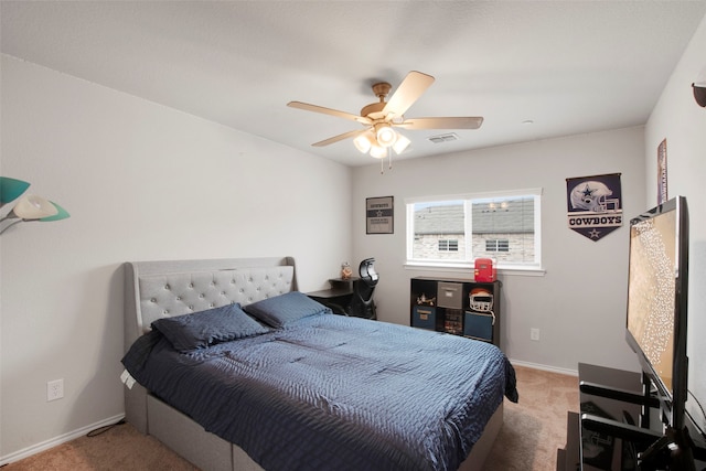 bedroom featuring carpet floors, baseboards, ceiling fan, and visible vents