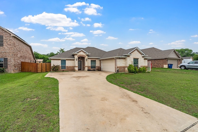 ranch-style house with brick siding, a garage, a front lawn, and concrete driveway