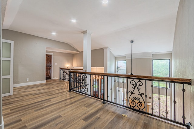 1603 Hawthorne Dr, Arlington, TX 76012 - corridor featuring recessed lighting, baseboards, an upstairs landing, wood finished floors, and lofted ceiling