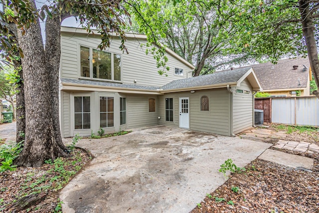 1603 Hawthorne Dr, Arlington, TX 76012 - rear view of property with a patio, central AC unit, and a shingled roof