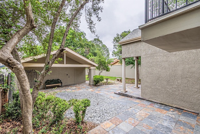 1603 Hawthorne Dr, Arlington, TX 76012 - view of patio featuring fence