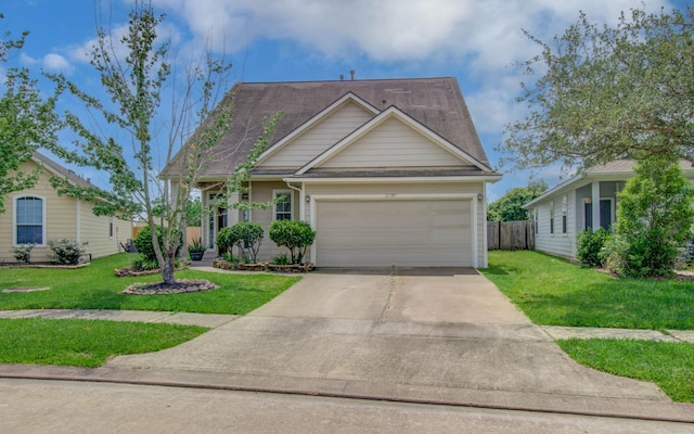 21107 Pine Monte Ridge Ln, Katy, TX 77449 - view of front facade featuring a garage, fence, driveway, and a front yard