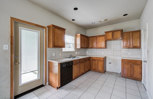 21107 Pine Monte Ridge Ln, Katy, TX 77449 - kitchen featuring a sink, visible vents, brown cabinets, and dishwasher