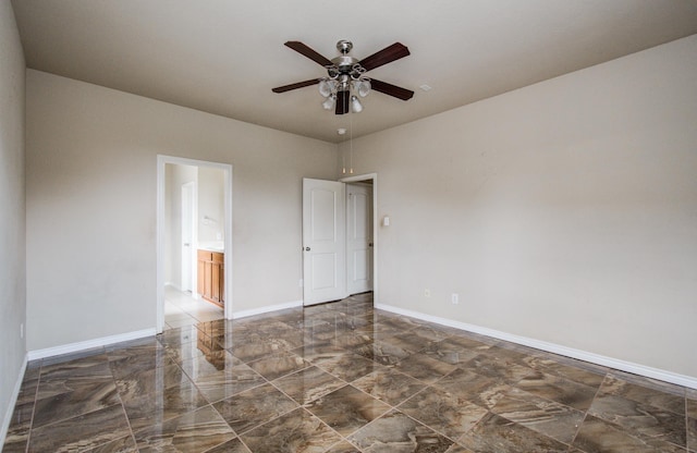 21107 Pine Monte Ridge Ln, Katy, TX 77449 - spare room featuring baseboards, a ceiling fan, and marble finish floor