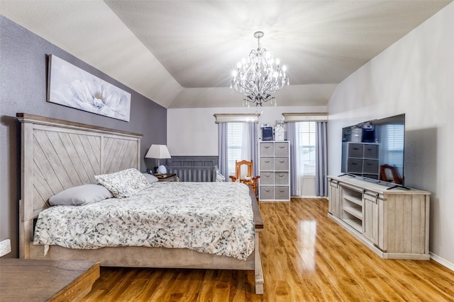 9813 Jericho Ln, Fort Worth, TX 76108 - bedroom with light wood-style floors, lofted ceiling, and a chandelier