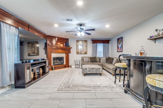 9813 Jericho Ln, Fort Worth, TX 76108 - living room with a fireplace, a ceiling fan, a dry bar, and recessed lighting