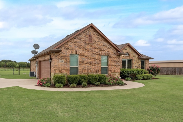 view of side of home featuring driveway, a lawn, brick siding, cooling unit, and an attached garage