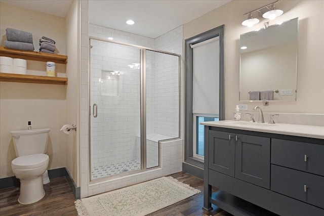 2449 Tanglewood Blvd, Pottsboro, TX 75076 - full bath with wood finished floors, toilet, a shower stall, and recessed lighting