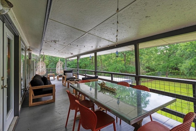 2449 Tanglewood Blvd, Pottsboro, TX 75076 - sunroom featuring plenty of natural light and outdoor dining space