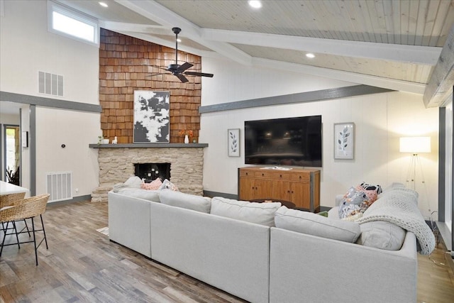 2449 Tanglewood Blvd, Pottsboro, TX 75076 - living room featuring beamed ceiling, wood finished floors, a ceiling fan, plenty of natural light, and high vaulted ceiling
