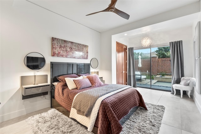 bedroom featuring access to outside, baseboards, ceiling fan, and tile patterned flooring