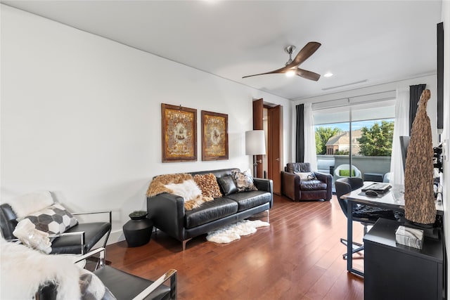 living room with a ceiling fan, recessed lighting, and wood finished floors
