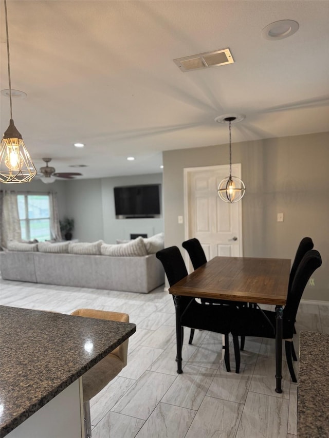 1617 Tyson St, Blue Mound, TX 76131 - dining space featuring recessed lighting, ceiling fan, marble finish floor, and visible vents