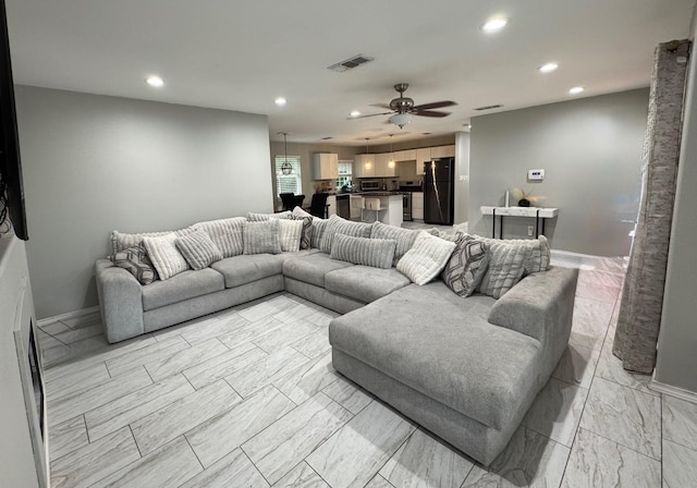 1617 Tyson St, Blue Mound, TX 76131 - living area featuring marble finish floor, recessed lighting, a ceiling fan, baseboards, and visible vents