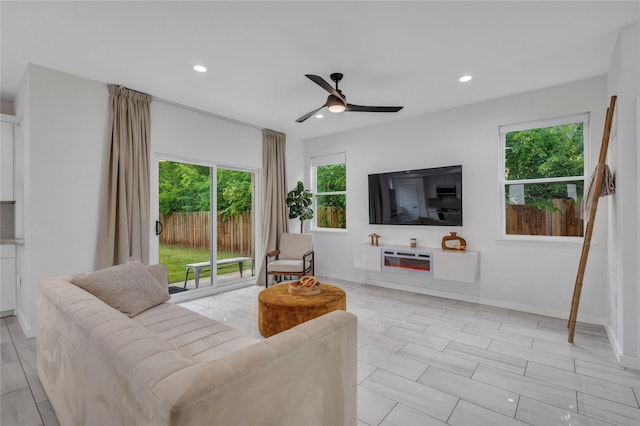 1619 Homeland St, Dallas, TX 75212 - living area with recessed lighting, a ceiling fan, and baseboards
