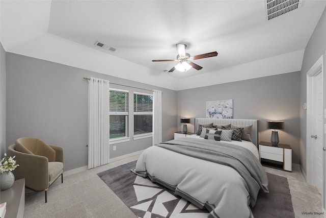 bedroom with baseboards, carpet, a ceiling fan, and visible vents